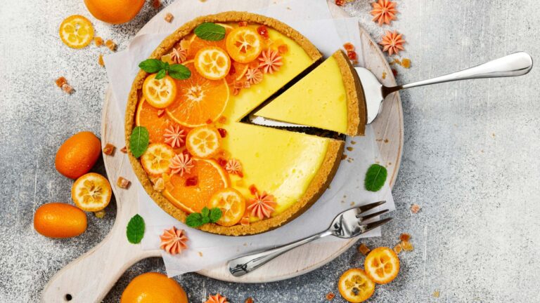 cheesecake with slices of orange and kumquat 16 9
